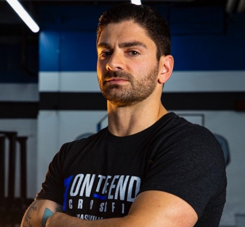 <p>Weightlifting Coach</p>