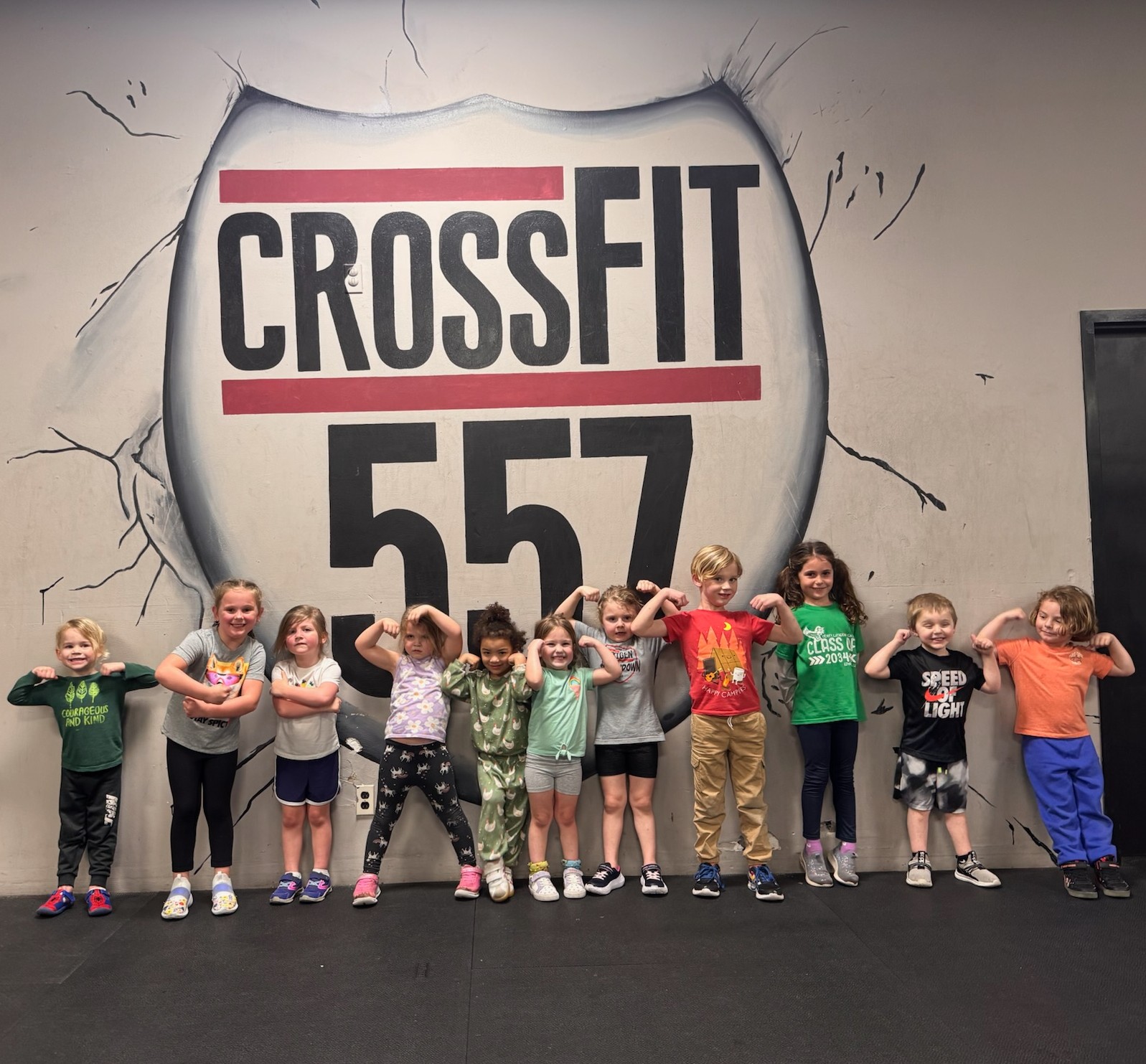 a gym with a barbell and weight plates