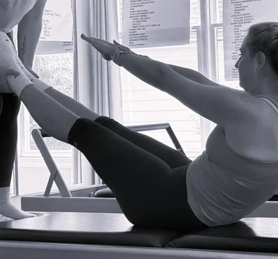 black and white speakers on white shelf